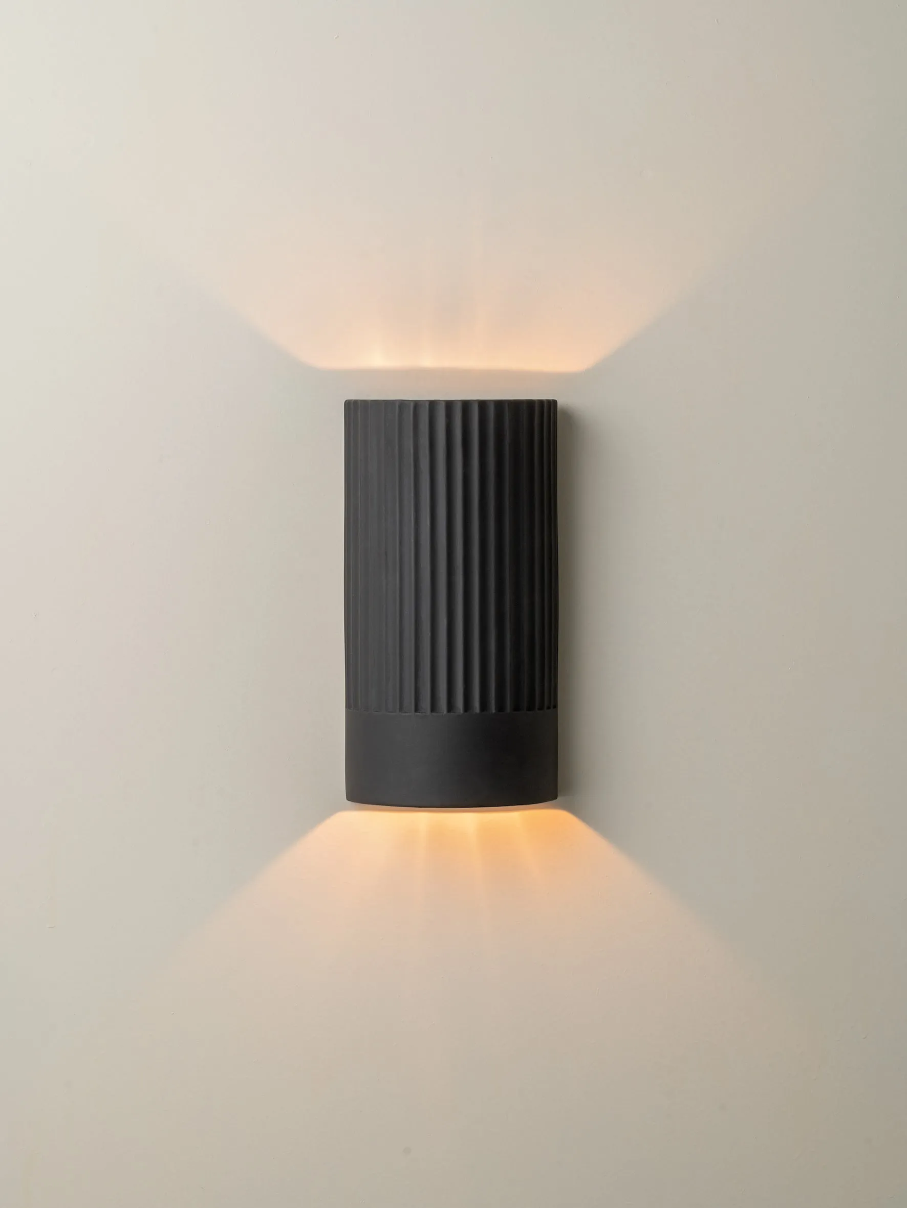 Nitara - chocolate ribbed concrete wall light